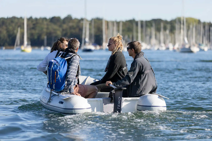 TEMO 1000 electric outboard with removable 949 Wh battery on a dinghy transom