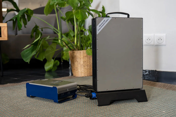 TEMO 2.3 kWh battery standing in the 8A home charger dock while charging