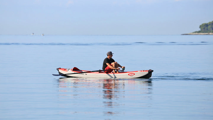 AIRKAYAK 16 on the shoreline loaded with touring luggage