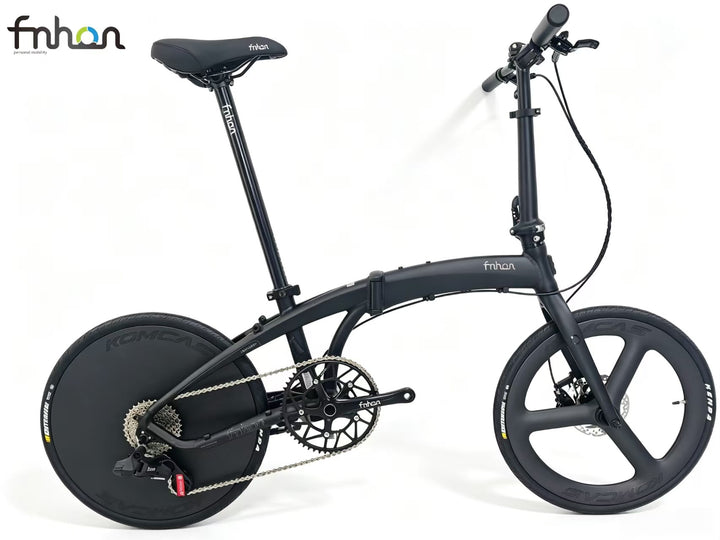 Matte black Fnhon 20-inch folding bike with KOMCAS carbon tri-spoke front wheel and carbon disc rear wheel, side view