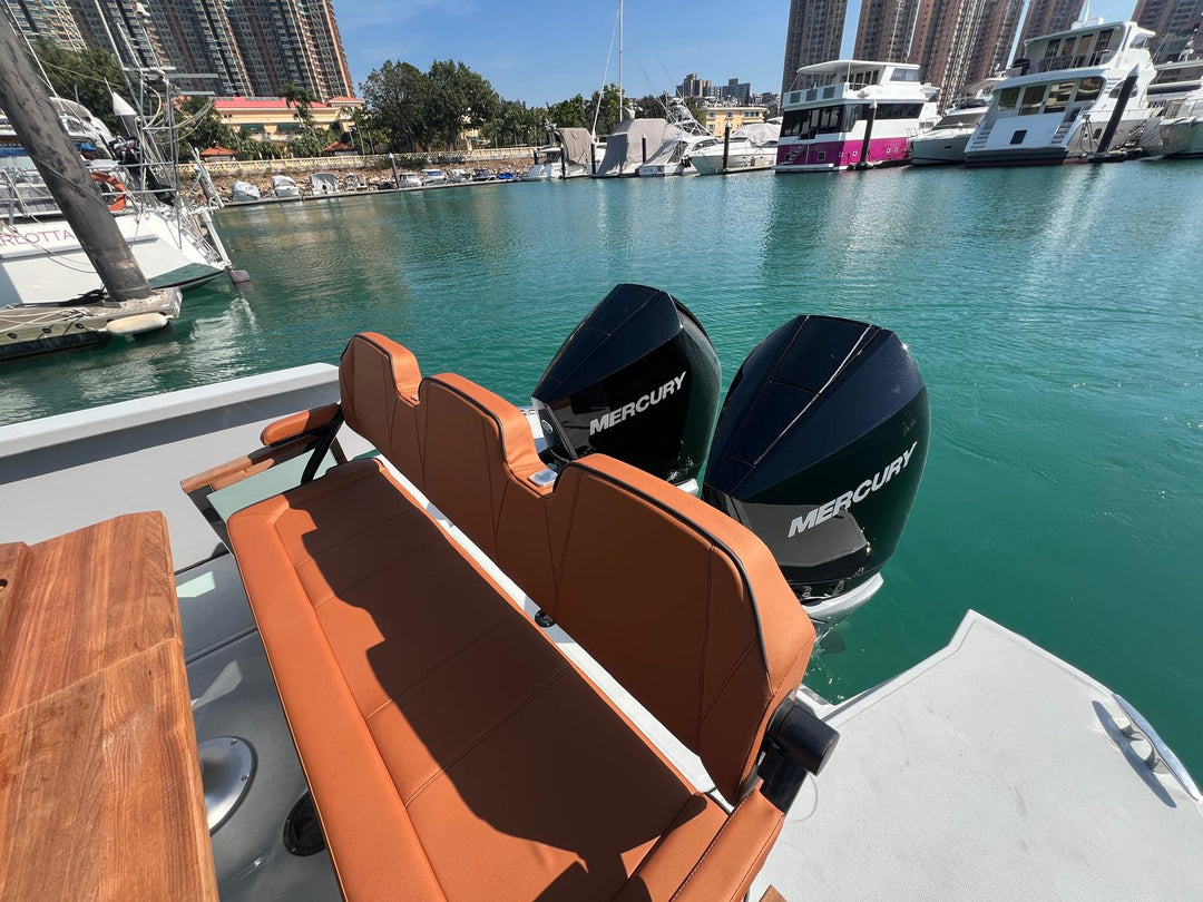 Twin Mercury V8 300hp outboard engines and cognac leather aft bench on the used Saxdor 320 GTC