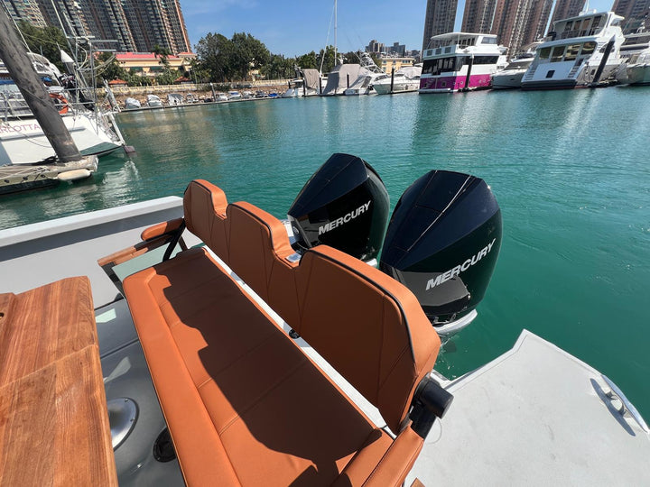 Twin Mercury V8 300hp outboard engines and cognac leather aft bench on the used Saxdor 320 GTC